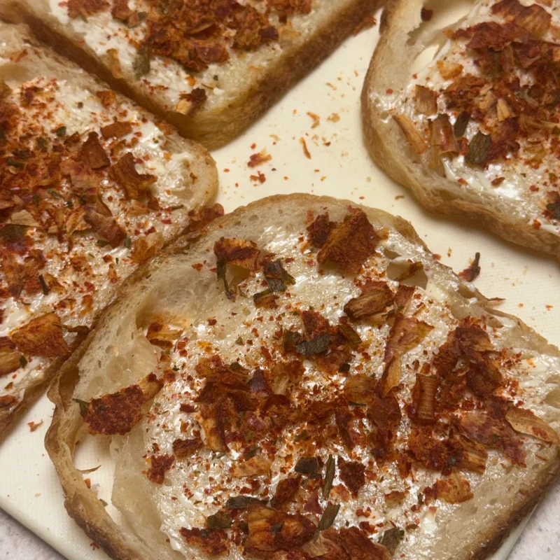 Dried kimchi used as a topping on bread