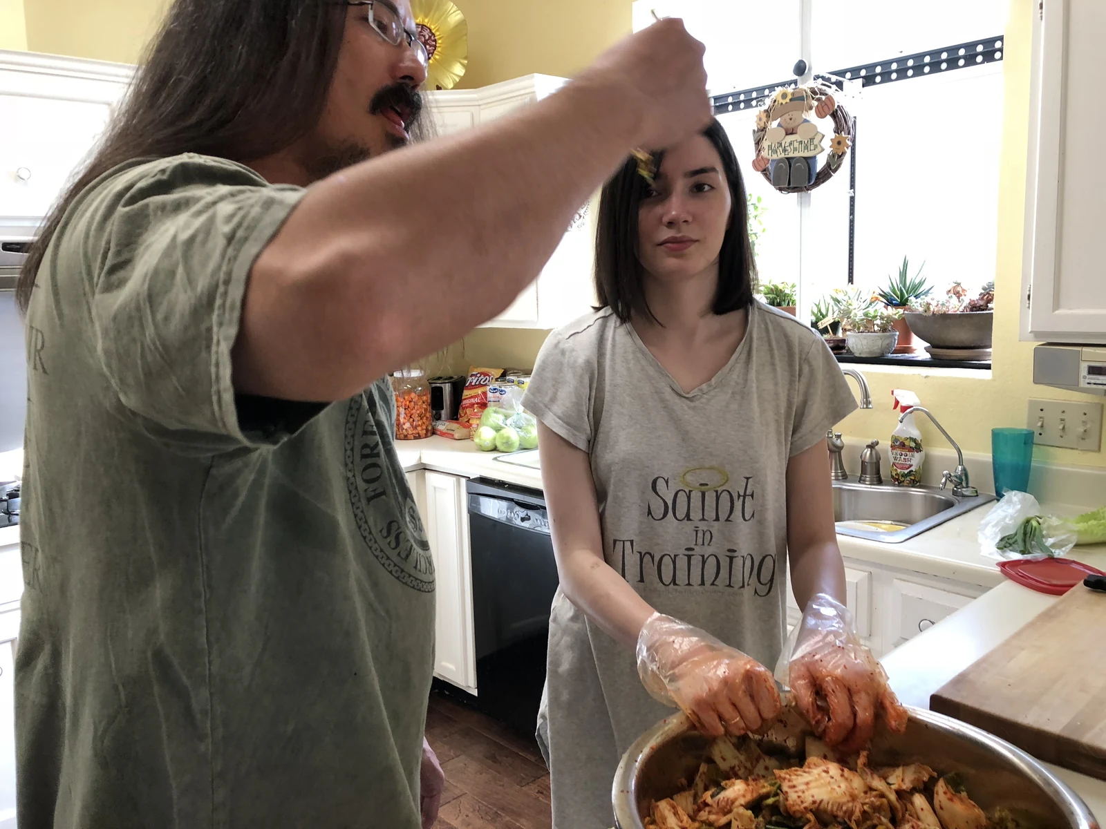 John and Fiona making kimchi at home in 2018