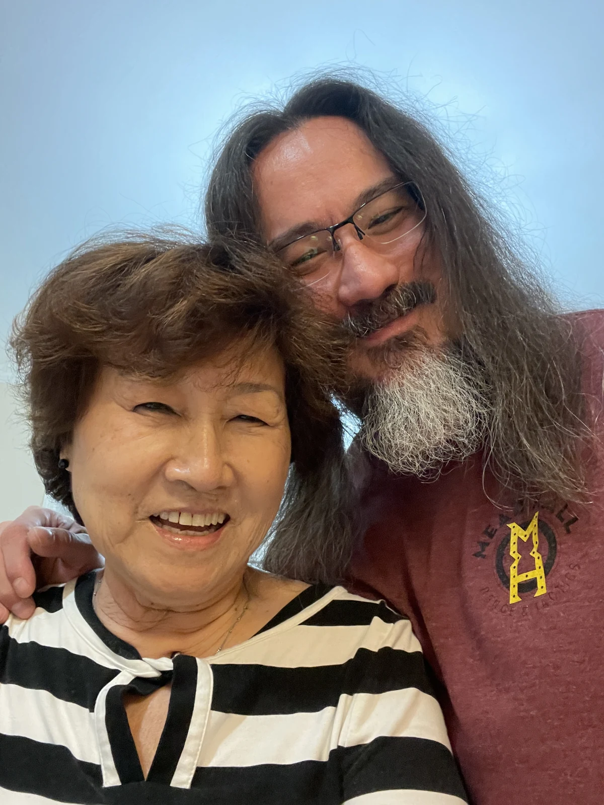 John and his mother in 2022